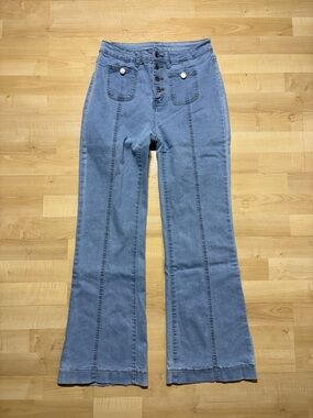 High-Rise Light Blue Flare Jeans with Front Button Detail